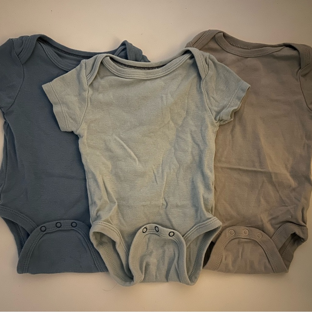 Set of three baby body suit shirts